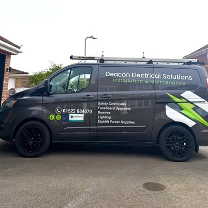 Deacon Electrical Solutions van with green and white branding